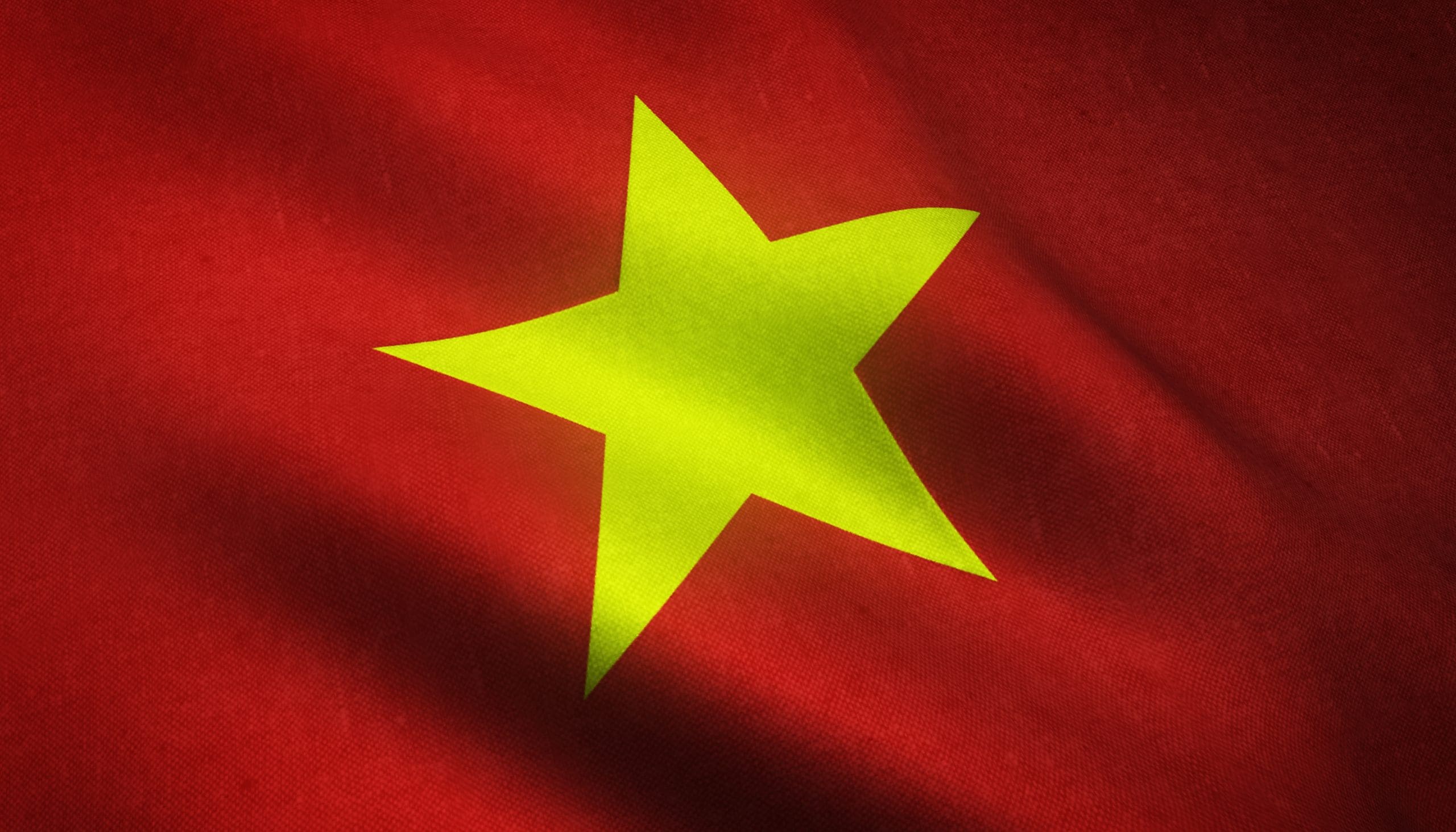 Closeup shot of the realistic flag of Vietnam with interesting textures